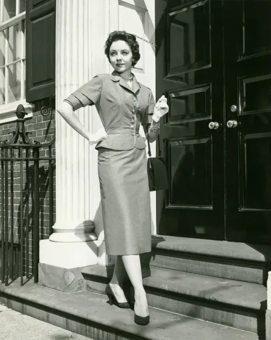 Framed Print : Elegant woman posing at entrance to building, (B&W), portrait Framed Print : Elegant woman posing at entrance to building, (B&W), portrait