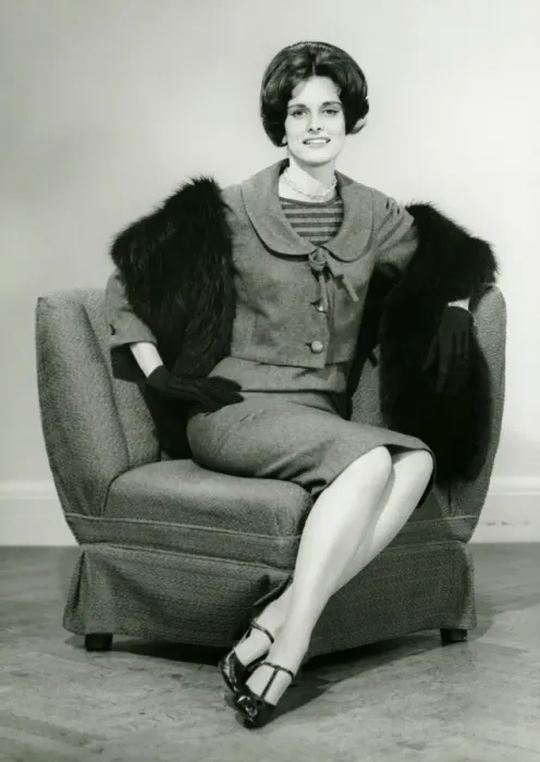 Framed Print : Elegant woman sitting on arm chair in studio, (B&W), portrait Framed Print : Elegant woman sitting on arm chair in studio, (B&W), portrait