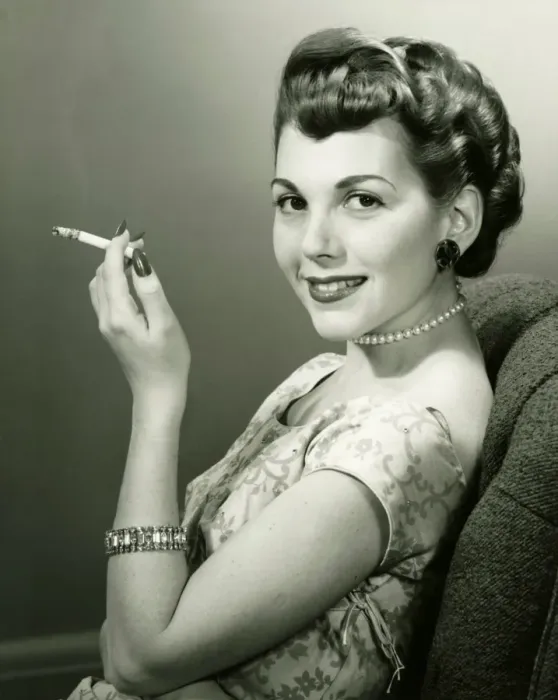 Framed Print : Elegant woman smoking cigarette, posing in studio, (B&W), portrait Framed Print : Elegant woman smoking cigarette, posing in studio, (B&W), portrait