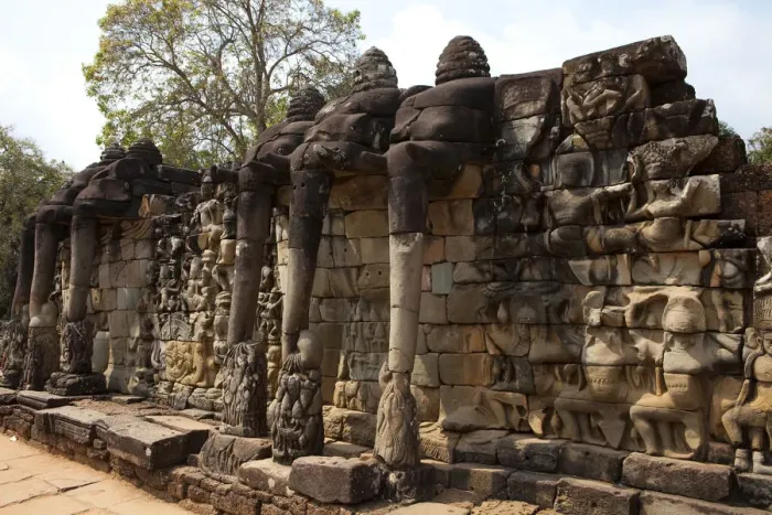 Framed Print : Elephant Statues on Wall