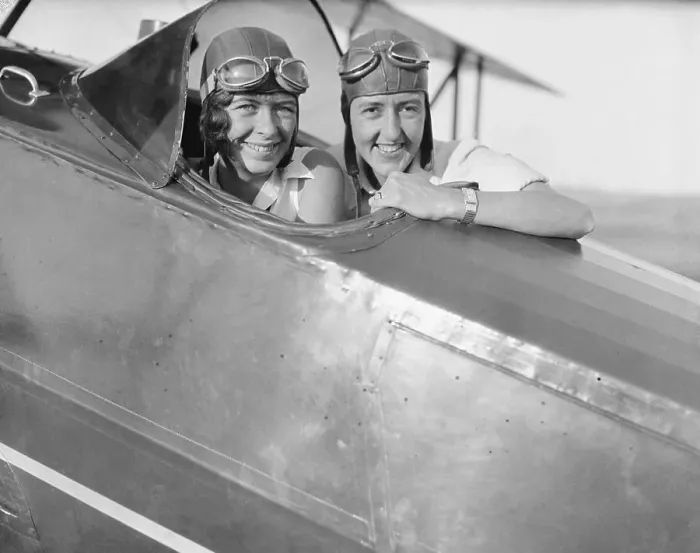 Framed Print : Elinor Smith and Bobbie Trout in an Airplane Cockpit