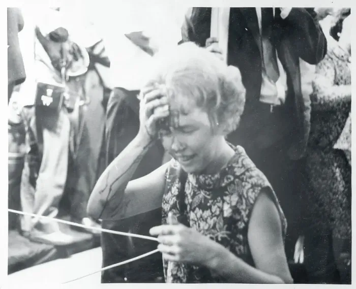 Framed Print : Elizabeth Evans Wiping Blood From Her Face Framed Print : Elizabeth Evans Wiping Blood From Her Face