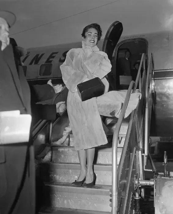Framed Print : Elizabeth Taylor Leaving Airplane on Runway Framed Print : Elizabeth Taylor Leaving Airplane on Runway