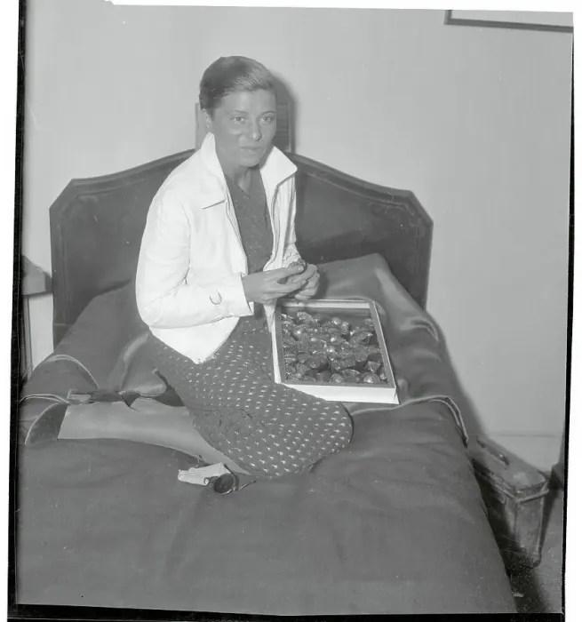 Framed Print : Elly Beinhorn Sitting on a Bed Framed Print : Elly Beinhorn Sitting on a Bed