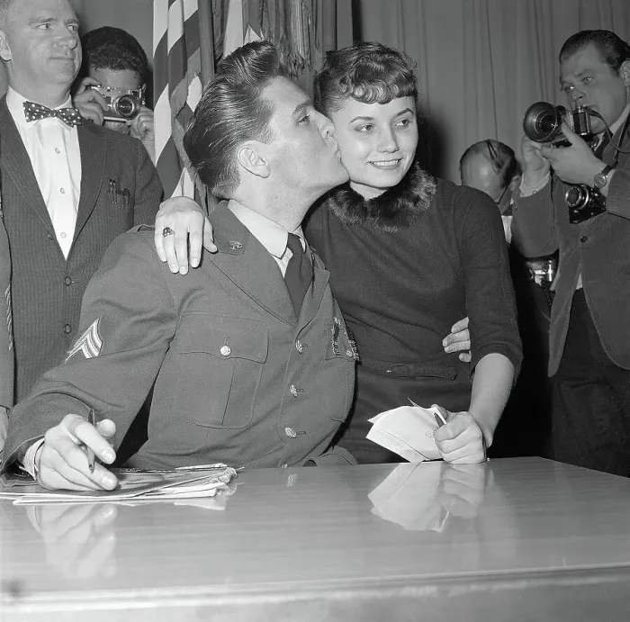Framed Print : Elvis Kisses Woman at Press Conference Framed Print : Elvis Kisses Woman at Press Conference