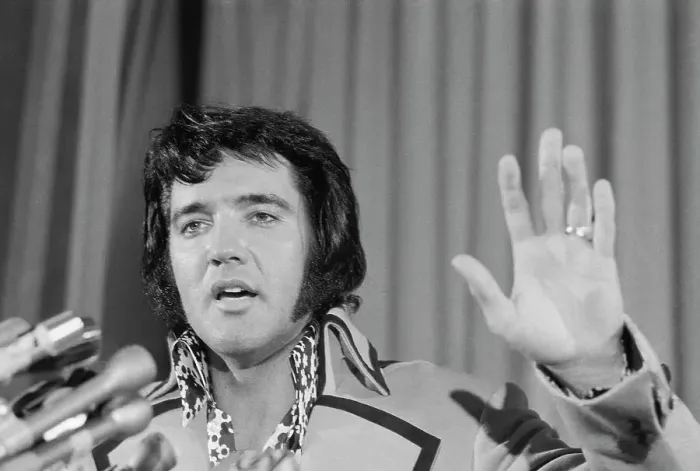 Framed Print : Elvis Presley Gesturing with His Hand Framed Print : Elvis Presley Gesturing with His Hand