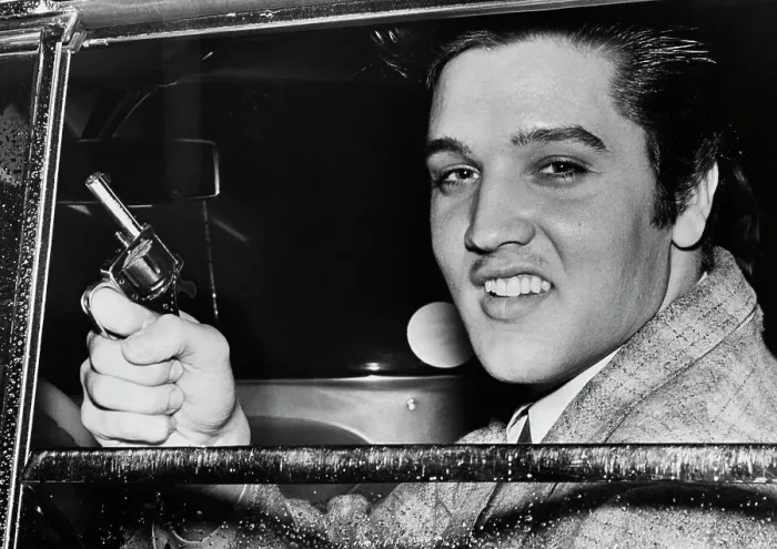 Framed Print : Elvis Presley Holds Toy Pistol Framed Print : Elvis Presley Holds Toy Pistol