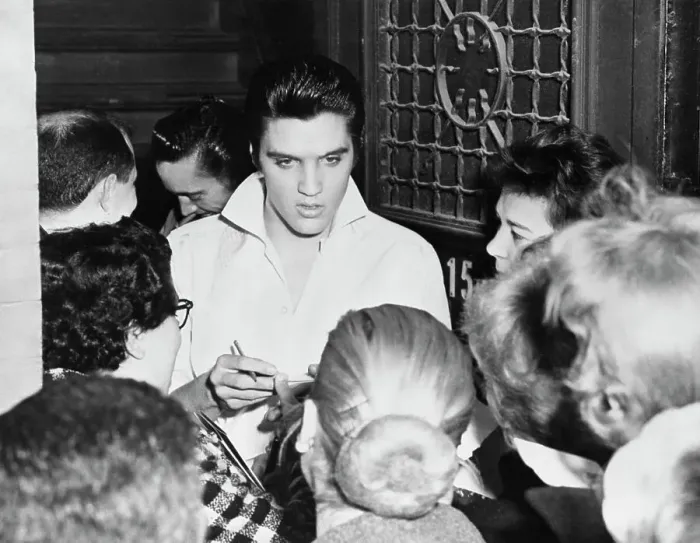 Framed Print : Elvis Presley Signs Girls Autographs Framed Print : Elvis Presley Signs Girls Autographs