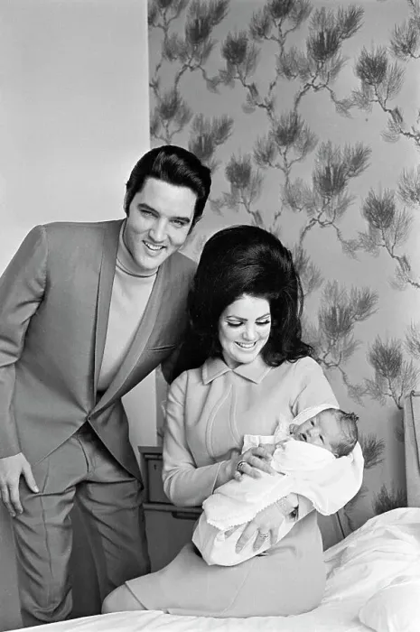 Framed Print : Elvis Presley With Wife And Newborn Framed Print : Elvis Presley With Wife And Newborn
