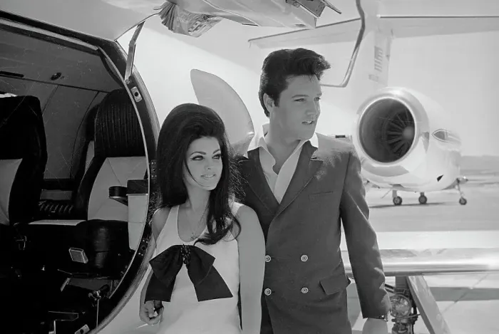 Framed Print : Elvis and Priscilla Presley Posing near Airplane Framed Print : Elvis and Priscilla Presley Posing near Airplane