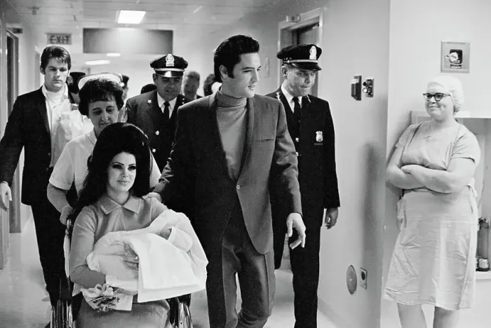 Framed Print : Elvis with Wife and Daughter at Hospital Framed Print : Elvis with Wife and Daughter at Hospital