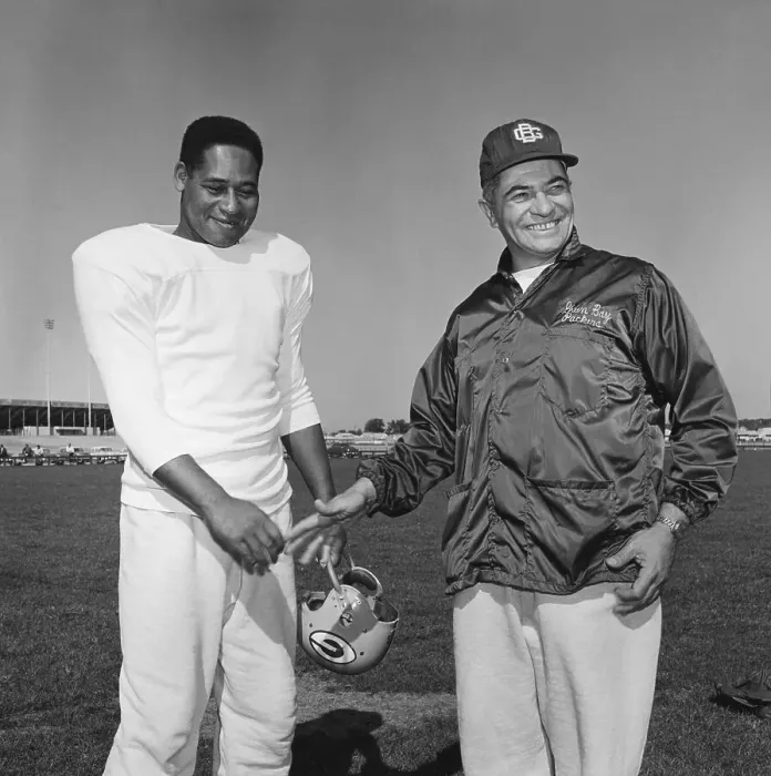 Framed Print : Em Tunnell Shaking Hands With Vince Lombardi Framed Print : Em Tunnell Shaking Hands With Vince Lombardi