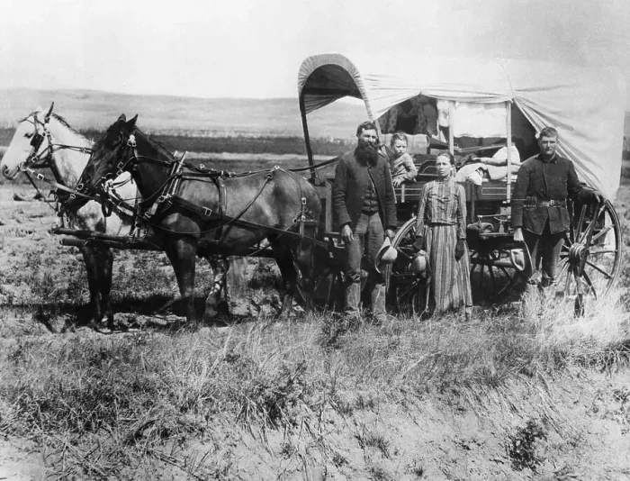 Framed Print : Emigrants Moving with Covered Wagon Framed Print : Emigrants Moving with Covered Wagon