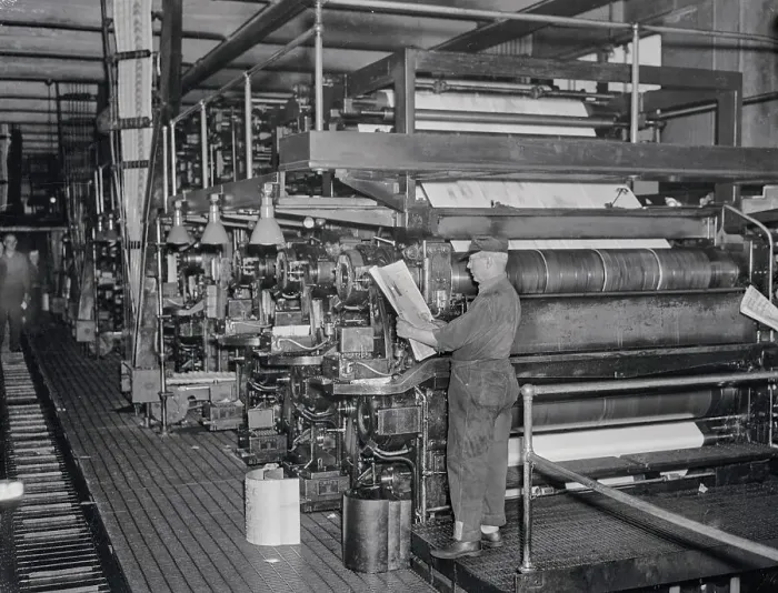 Framed Print : Employee Holding Newspaper in The Journal American Press Room