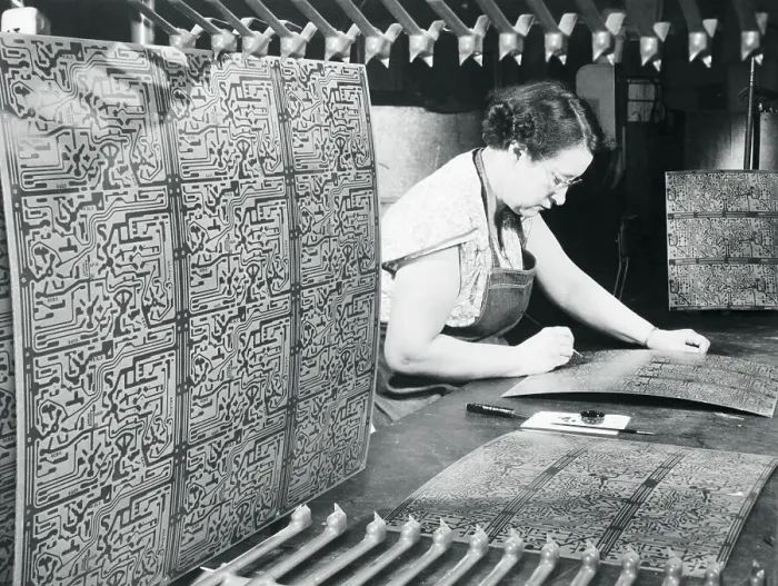 Framed Print : Employee Inspecting Printed Circuits Framed Print : Employee Inspecting Printed Circuits