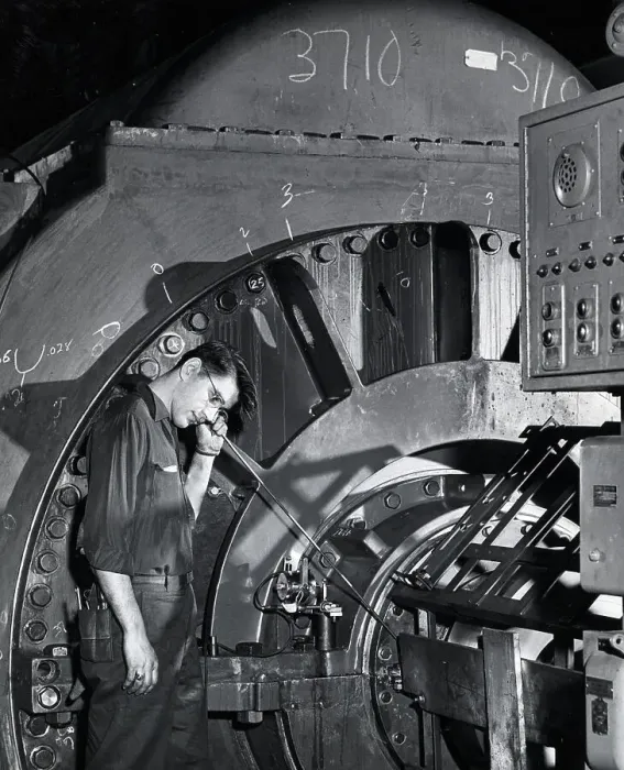 Framed Print : Engineer Listens To Rotor Of Generator Framed Print : Engineer Listens To Rotor Of Generator