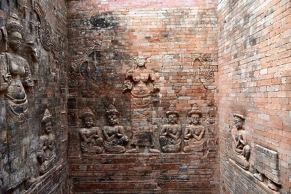 Engraving on the walls of Prasat Kravan temple Angkor Cambodia