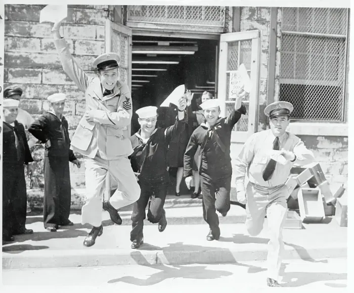 Framed Print : Enlisted Men Waving Their Discharge Papers in the Air Framed Print : Enlisted Men Waving Their Discharge Papers in the Air
