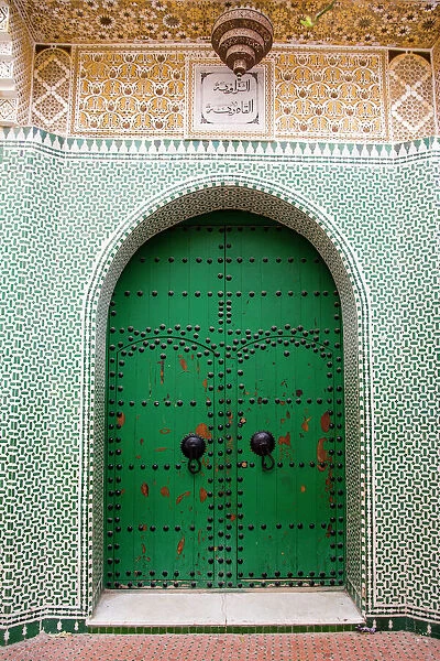 Entrance to a Moroccan house with a green door