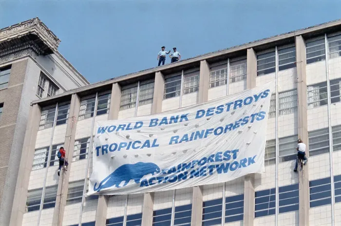 Framed Print : Environmental Protesters Scaling Skyscraper with Banner Display Framed Print : Environmental Protesters Scaling Skyscraper with Banner Display