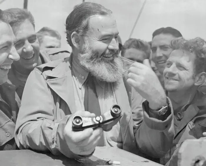Framed Print : Ernest Hemingway with GIs Framed Print : Ernest Hemingway with GIs