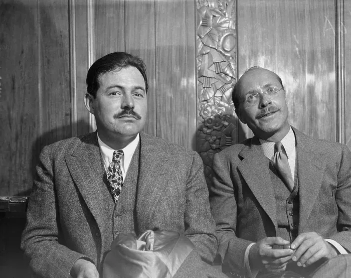 Framed Print : Ernest Hemingway Sitting with Donald Ogdon Stewart Framed Print : Ernest Hemingway Sitting with Donald Ogdon Stewart