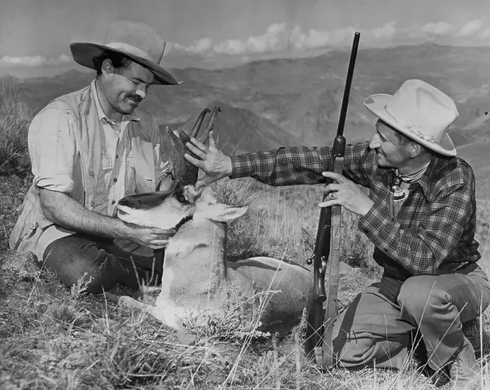Framed Print : Ernest Hemingway and Taylor Williams Inspecting an Antelope Framed Print : Ernest Hemingway and Taylor Williams Inspecting an Antelope