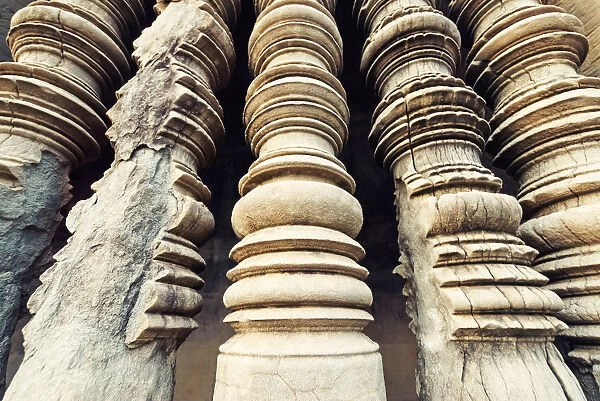 Eroded carved pillars, Angkor Wat Temple