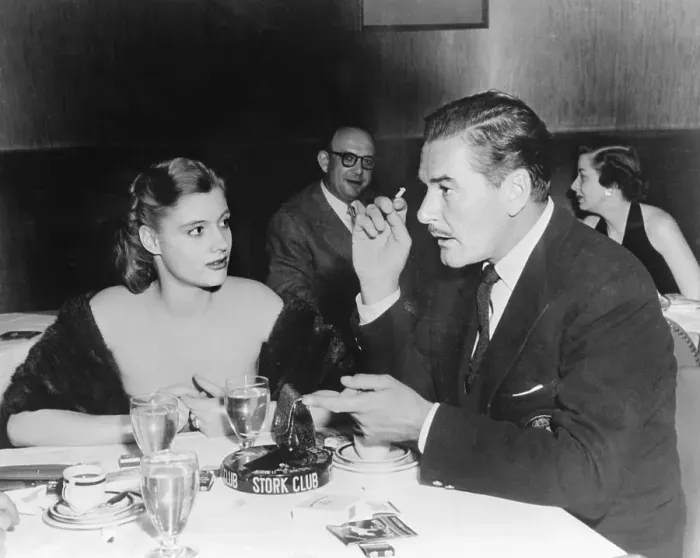 Framed Print : Errol Flynn Conversing with Thompson Andrews