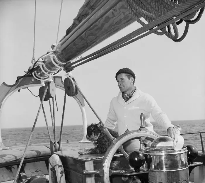 Framed Print : Errol Flynn at Helm of His New Boat Framed Print : Errol Flynn at Helm of His New Boat