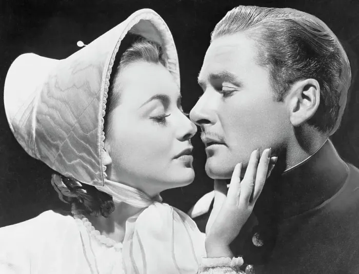 Framed Print : Errol Flynn Kissing Olivia de Havilland Framed Print : Errol Flynn Kissing Olivia de Havilland