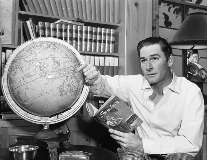 Framed Print : Errol Flynn Observing Globe Framed Print : Errol Flynn Observing Globe