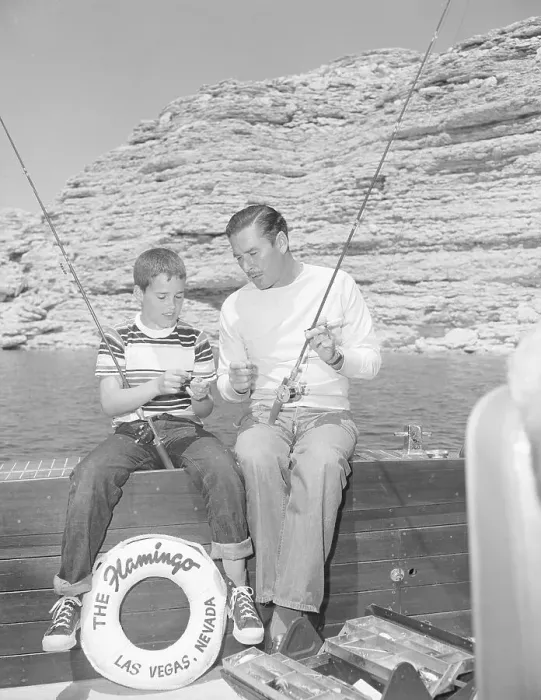 Framed Print : Errol Flynn And His Son Sean Fishing Framed Print : Errol Flynn And His Son Sean Fishing