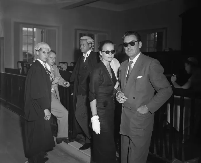 Framed Print : Errol Flynn with Wife in Court Framed Print : Errol Flynn with Wife in Court