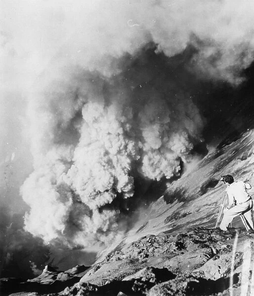 Eruption. April 1958: Naturalist photographer, Charles Lagus filming for the BBC