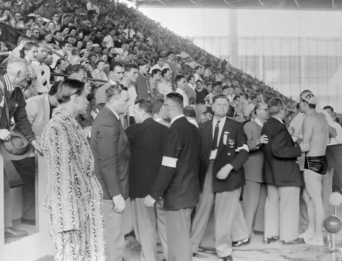 Framed Print : Ervin Zador Being Led from Olympic Pool