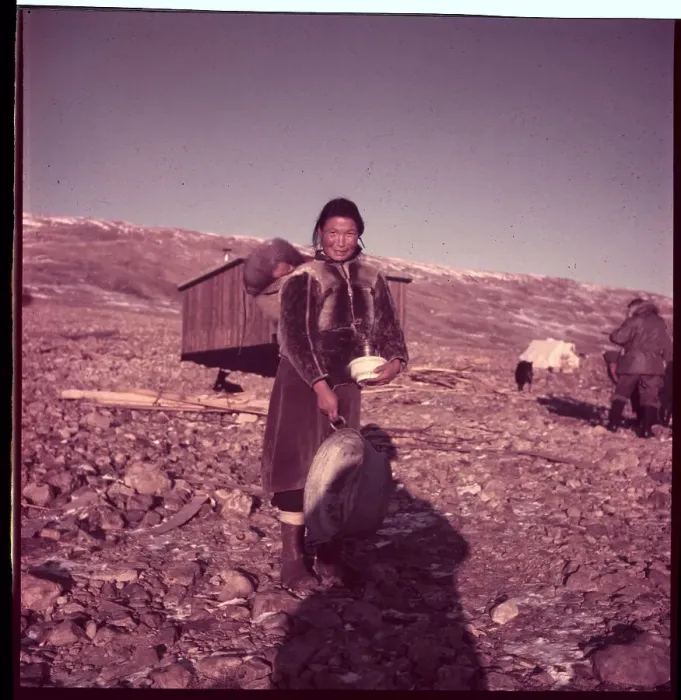 Framed Print : Eskimo Mother Carrying Utensils