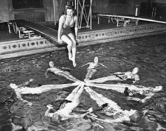 Framed Print : Esther Williams Sitting Above Swimmers Framed Print : Esther Williams Sitting Above Swimmers