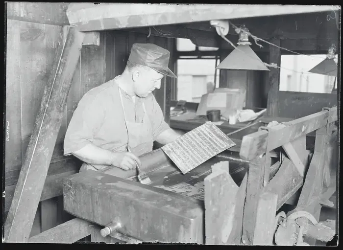 Framed Print : Etcher Concentrating Framed Print : Etcher Concentrating