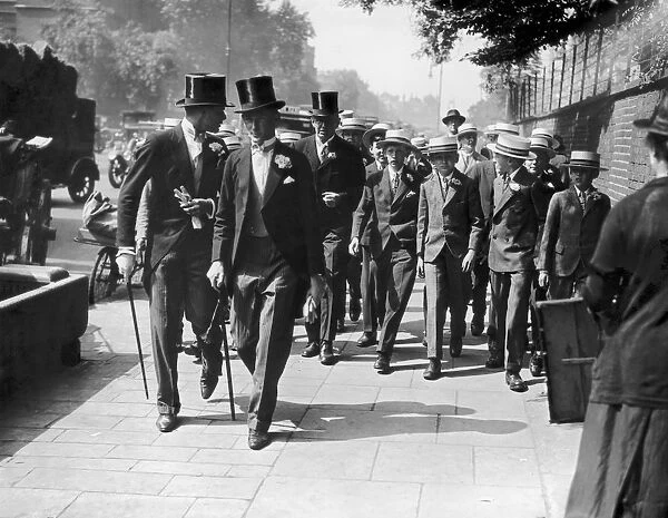 Eton Boys. 13th July 1928: A group of Eton and Harrow schoolboys arriving