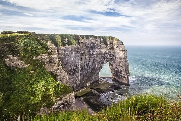 Etretat. White limestone cliffs of french coastline of Etretat, Normandy