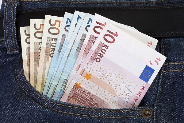 Euro bills in a jeans pocket
