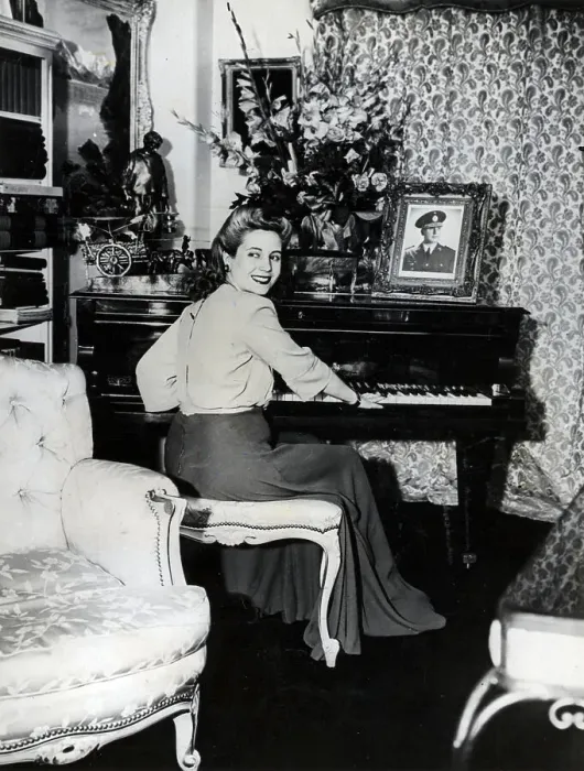 Framed Print : Eva Peron Playing The Piano Framed Print : Eva Peron Playing The Piano