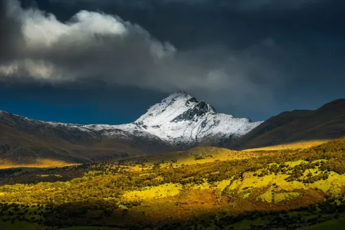 Framed Print : evening light shine upon mountain range