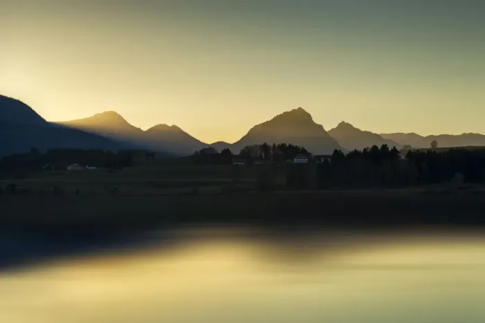 Framed Print : Evening light on the shore of Hopfensee Lake, Allgaeu Alps at back, Fuessen, Ostallgaeu region, Allgaeu, Bavaria, Germany, Europe Framed Print : Evening light on the shore of Hopfensee Lake, Allgaeu Alps at back, Fuessen, Ostallgaeu region, Allgaeu, Bavaria, Germany, Europe