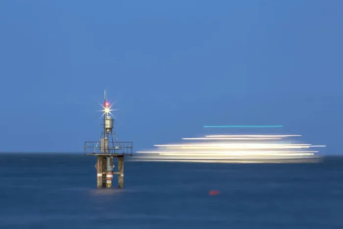 Framed Print : Evening mood with a with moving ship at the Hoernle Lighthouse, Lake Constance, Konstanz, Baden-Wurttemberg, Germany Framed Print : Evening mood with a with moving ship at the Hoernle Lighthouse, Lake Constance, Konstanz, Baden-Wurttemberg, Germany