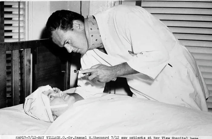 Framed Print : Examining a Patient Framed Print : Examining a Patient