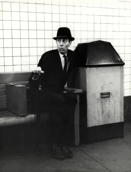 Framed Print : Executive with arm in public trash receptacle