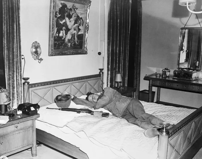 Framed Print : Exhausted American GI Sleeping on Goering's Bed Framed Print : Exhausted American GI Sleeping on Goering's Bed