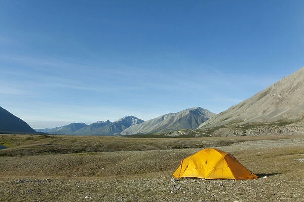Expedition tent, arctic tundra, camping, Wind River and Mackenzie Mountains behind, Peel Watershed, Yukon Territory, Canada